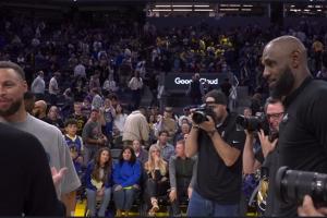 库里专注唠嗑 詹姆斯在一旁耐心等待随后温情相拥